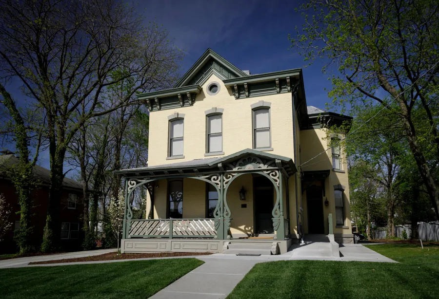 The front of the house under a deep blue sky